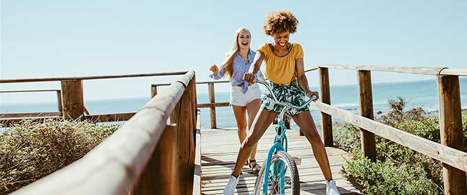 partner-covid-hero Women on boardwalk